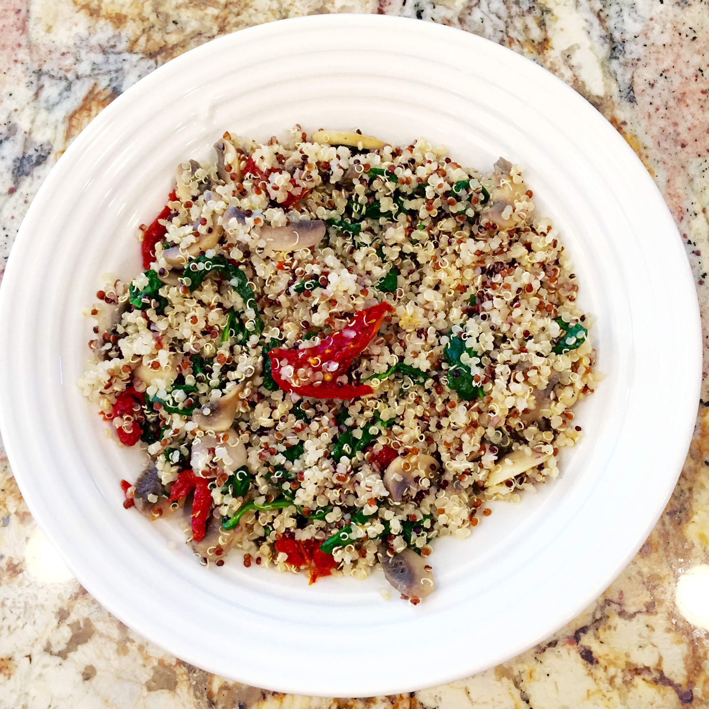 quinoa with mushrooms spinach and sun dried tomatoes